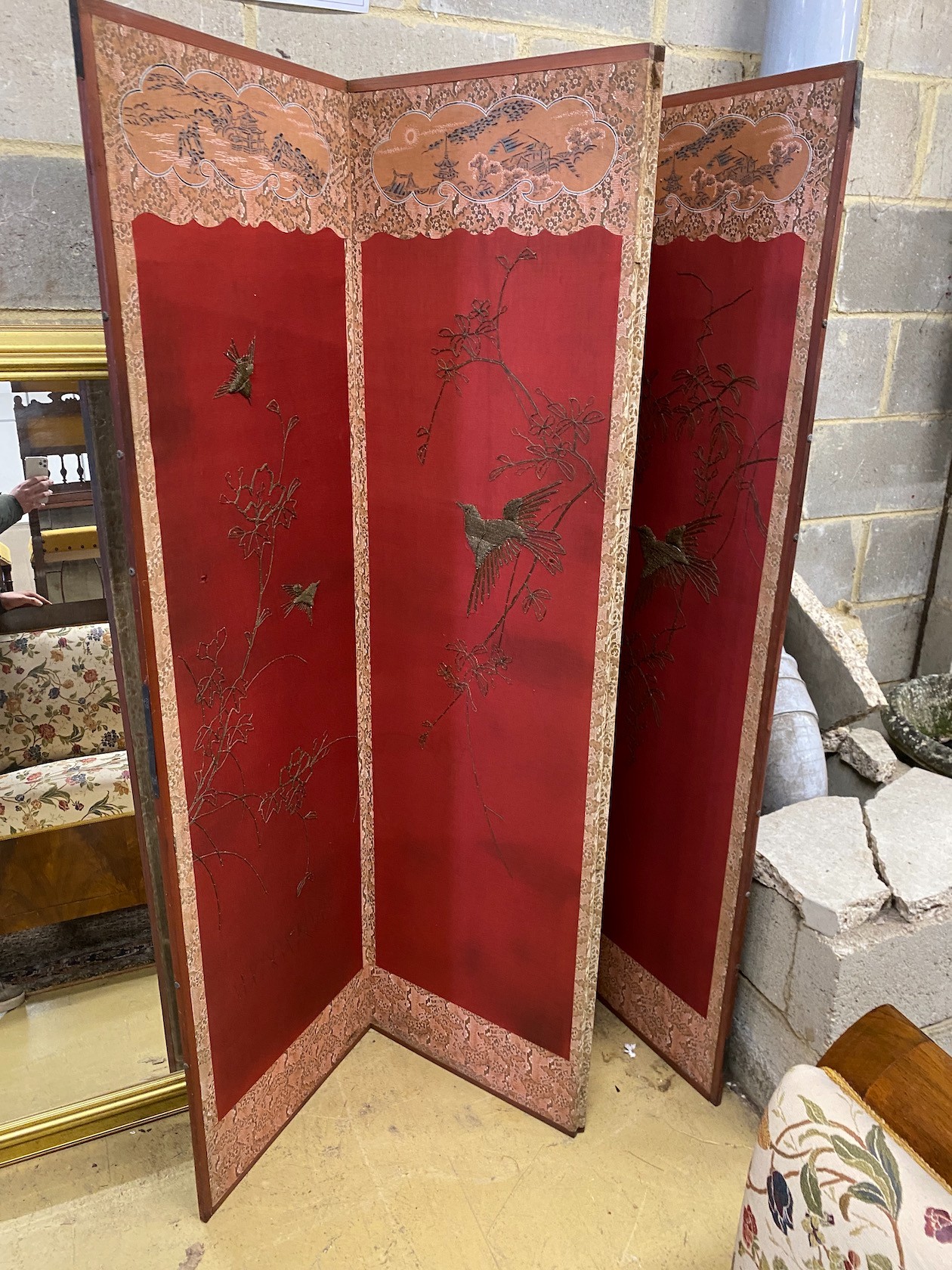 An embroidered Chinese style four fold dressing screen, each panel width 48cm, height 170cm